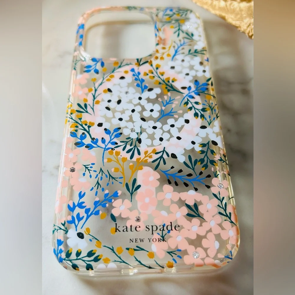 Kate Spade iPhone clear clover with flowers and a little bling